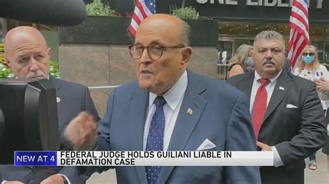 Judge holds Giuliani liable in Georgia election workers’ defamation case and orders him to pay fees
